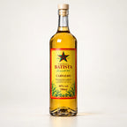 Garrafa da Cachaça Batista Carvalho 700ml com rótulo amarelo e estrela vermelha e verde, sobre fundo claro